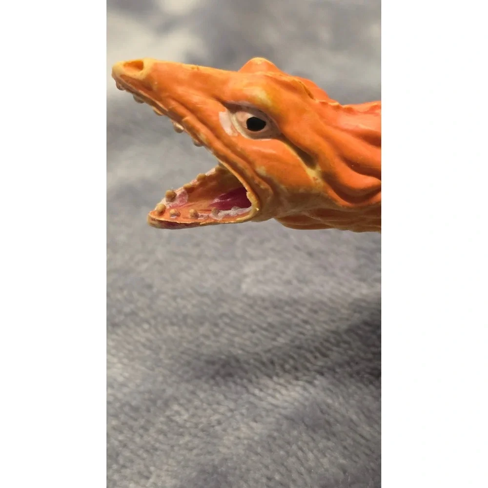 Vintage Orange Stegosaurus Dinosaur Toy Figure Made in China Plastic Monster